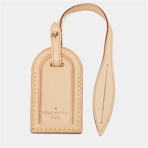 louis vuitton leather tag|louis vuitton engraving.